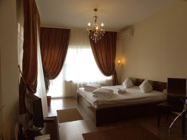 Ave Hotel Victoriei Bukarest Zimmer foto